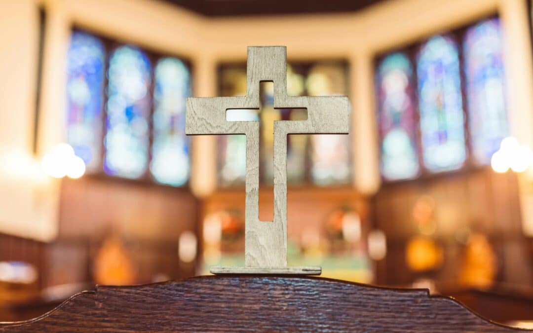 Close-up of Wooden Crucifix reflecting the Methodist Denominations.